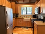 Modern Kitchen with Gas Range, Dishwasher and Fridge